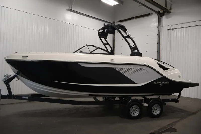 Slide: The Image of 2026 Bayliner D22I boat on trailer in indoor storage facility. - 7