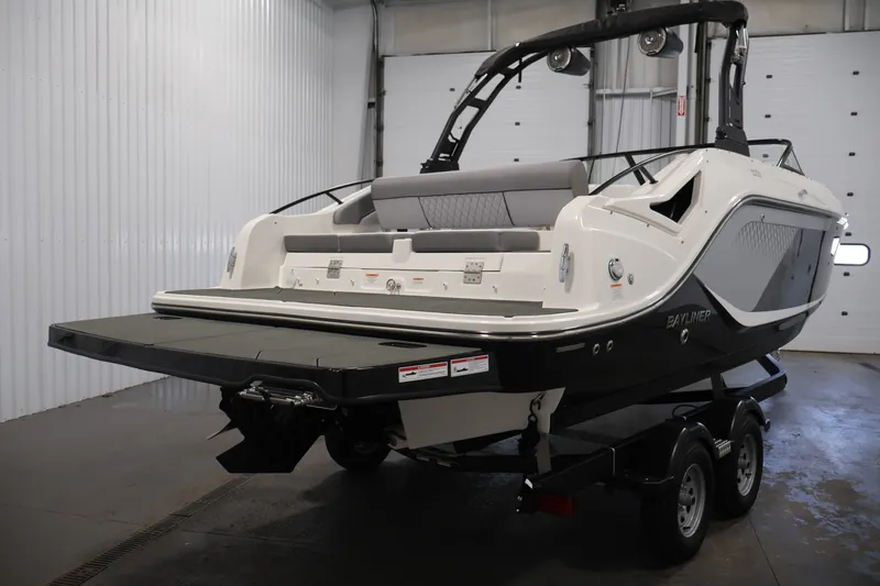 Slide: The Image of 2026 Bayliner D22I boat on trailer in indoor storage facility. - 4
