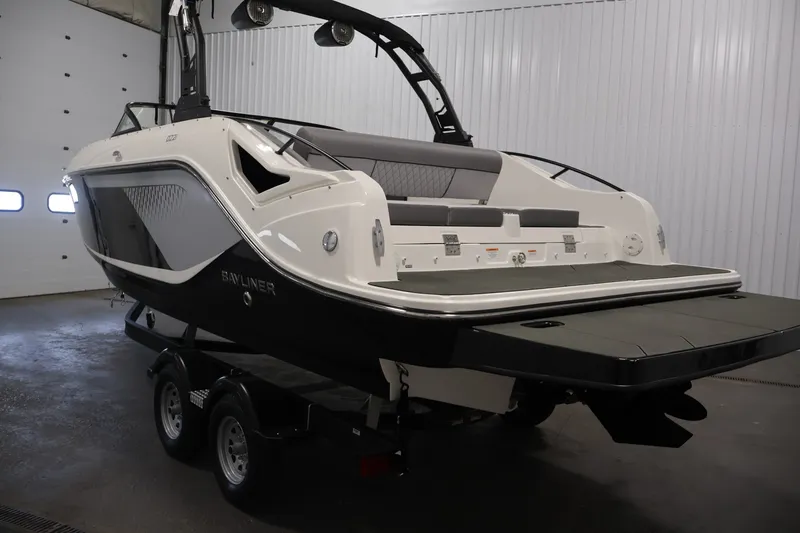 Slide: The Image of 2026 Bayliner D22I boat on trailer in indoor storage facility. - 6