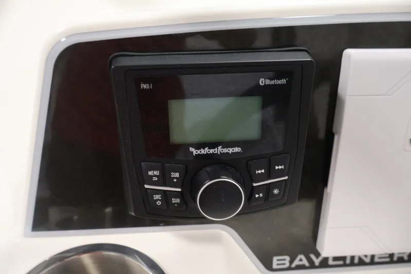 Slide: The Image of Close-up of a Rockford Fosgate Bluetooth stereo on a 2026 Bayliner D22I boat. - 18