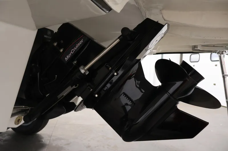 Slide: The Image of 2026 Bayliner D22I boat with MerCruiser engine and propeller detail. - 42