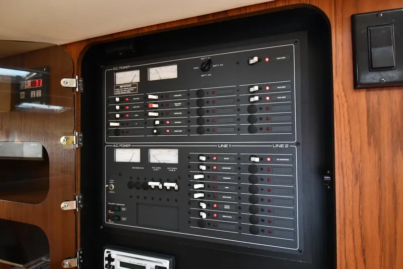Slide: The Image of Electrical control panel on a 1998 Tiara Yachts 3100 Open boat. - 33