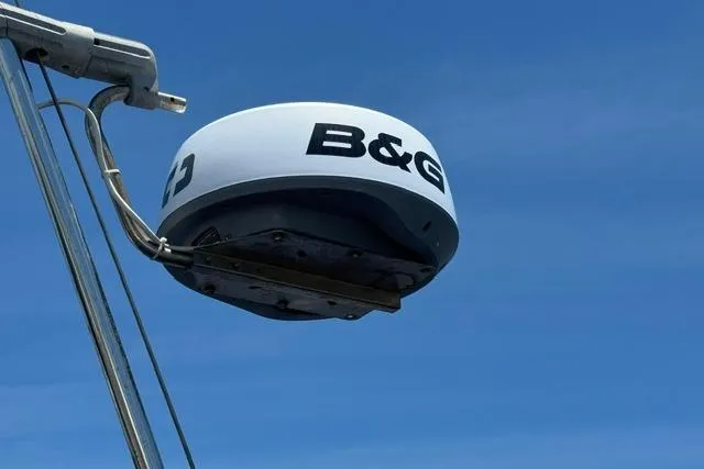 Slide: The Image of B&G radar on 1997 Island Packet 37 sailboat against clear blue sky. - 8