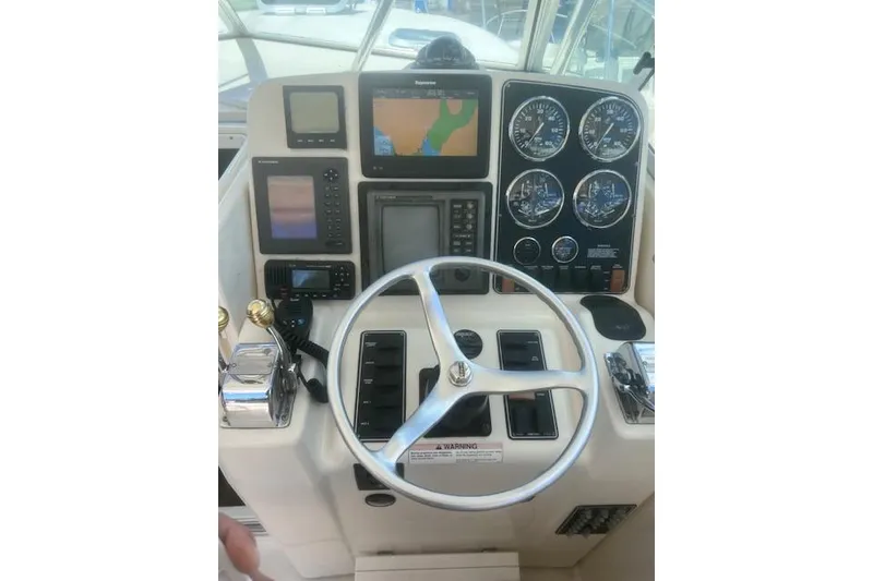 Slide: The Image of Control panel of a 2003 Pursuit 3000 Express boat with navigation instruments. - 20