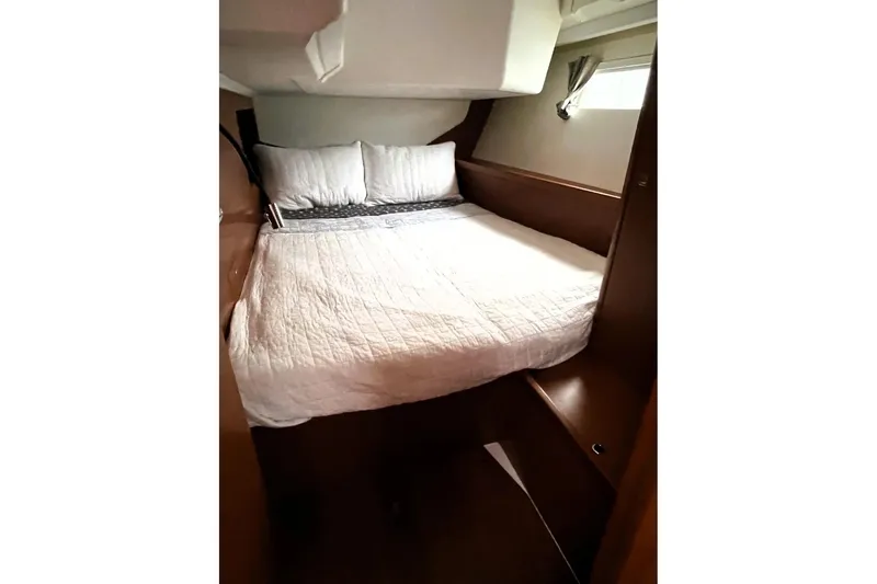 Slide: The Image of Cozy cabin interior of 2018 Beneteau Oceanis 45 yacht with comfortable bedding. - 46
