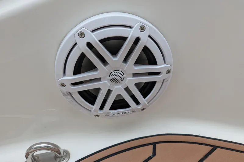 Slide: The Image of White JL Audio speaker on 2016 Brig E780 boat interior. - 20