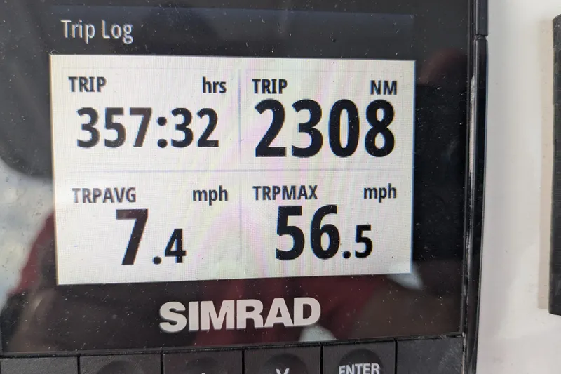 Slide: The Image of Simrad trip log display on 2016 Brig E780, showing trip duration and speed metrics. - 9