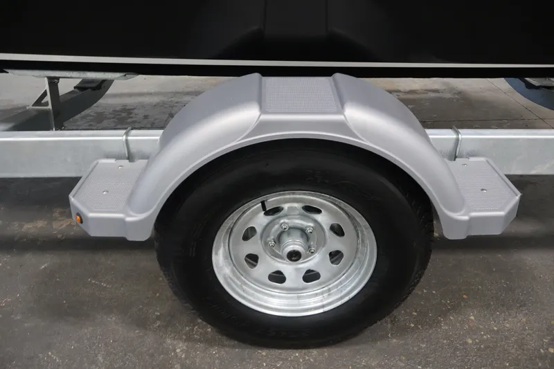 Slide: The Image of Trailer wheel and fender of 2026 Bayliner VR4 Bowrider OB boat. - 36