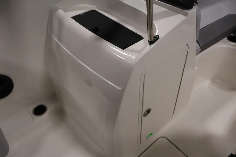Slide: The Image of 2026 Bayliner VR4 Bowrider OB interior detail, featuring sleek white console design. - 27