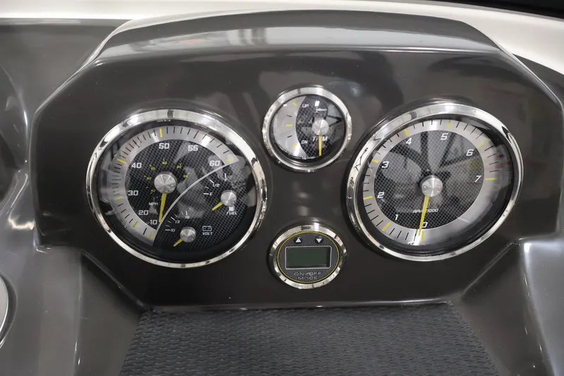 Slide: The Image of Dashboard of 2026 Bayliner VR4 Bowrider OB with speedometer and tachometer gauges. - 19
