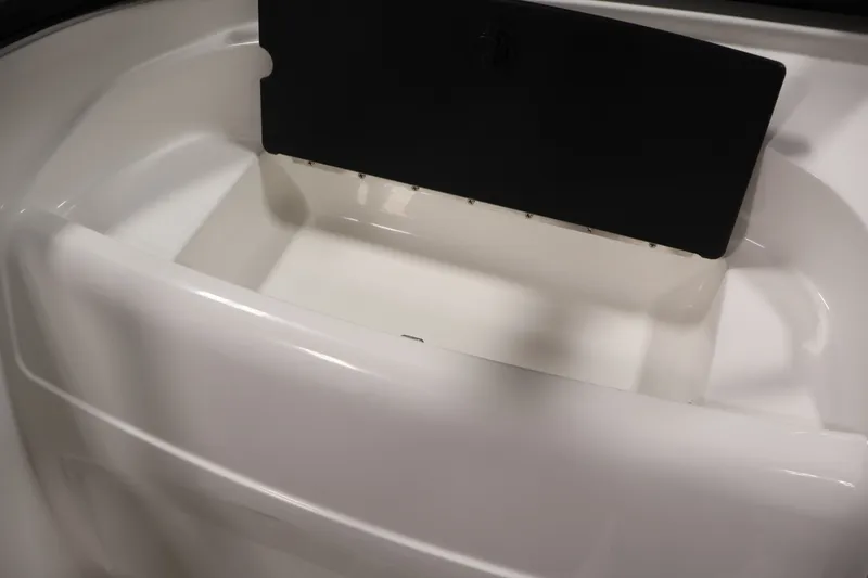Slide: The Image of 2026 Bayliner VR4 Bowrider OB storage compartment, featuring sleek white interior design. - 29