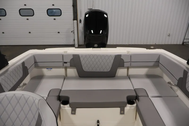 Slide: The Image of 2026 Bayliner VR4 Bowrider OB interior with gray seating and modern design. - 30