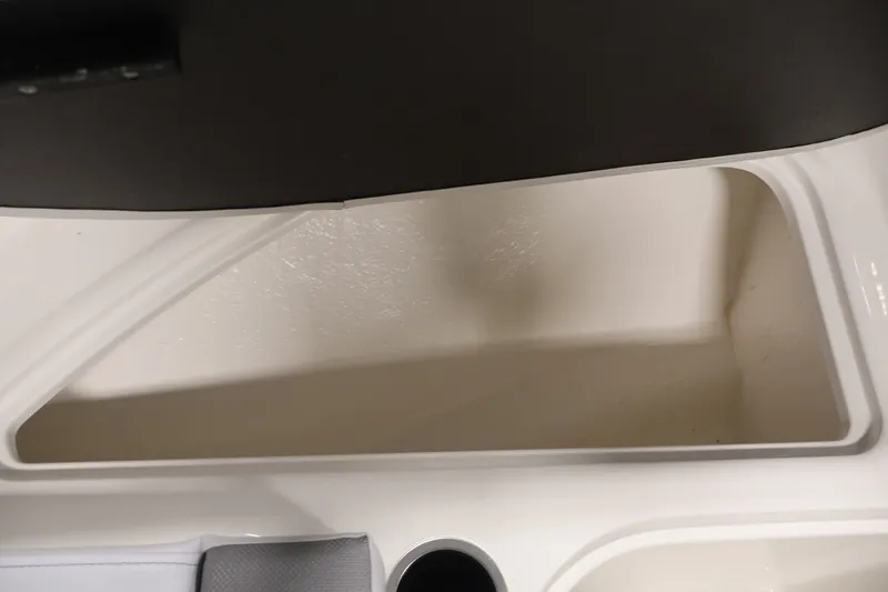Slide: The Image of 2026 Bayliner VR4 Bowrider OB storage compartment, featuring sleek design and ample space. - 15