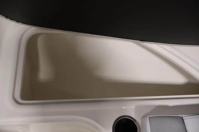 Slide: The Image of 2026 Bayliner VR4 Bowrider OB interior storage compartment and seating detail. - 13