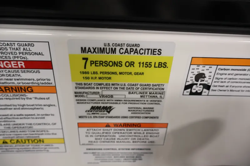 Slide: The Image of Bayliner VR4 Bowrider OB 2026 capacity label: 7 persons or 1155 lbs, 150 HP motor. - 22