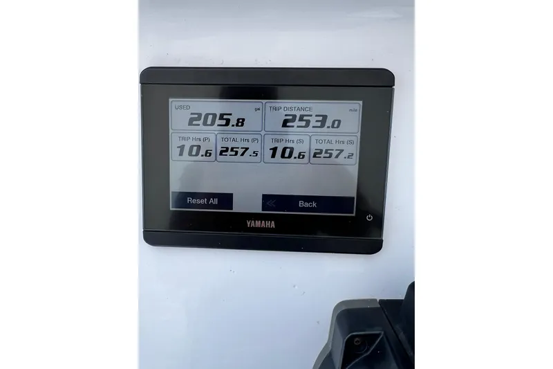 Slide: The Image of Yamaha display showing trip data on a 1973 Bertram 31 Flybridge Cruiser. - 37
