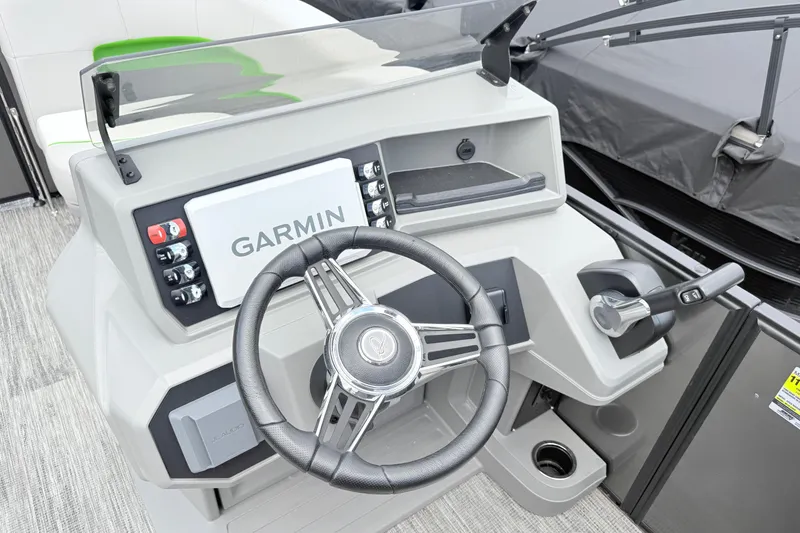 Slide: The Image of Steering console of 2026 Qwest E-Class RLS 18 with Garmin navigation system. - 11