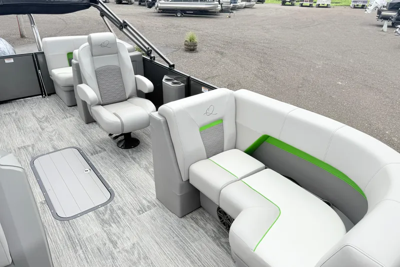 Slide: The Image of Luxurious interior of 2026 Qwest E-Class RLS 18 pontoon boat with modern seating. - 14