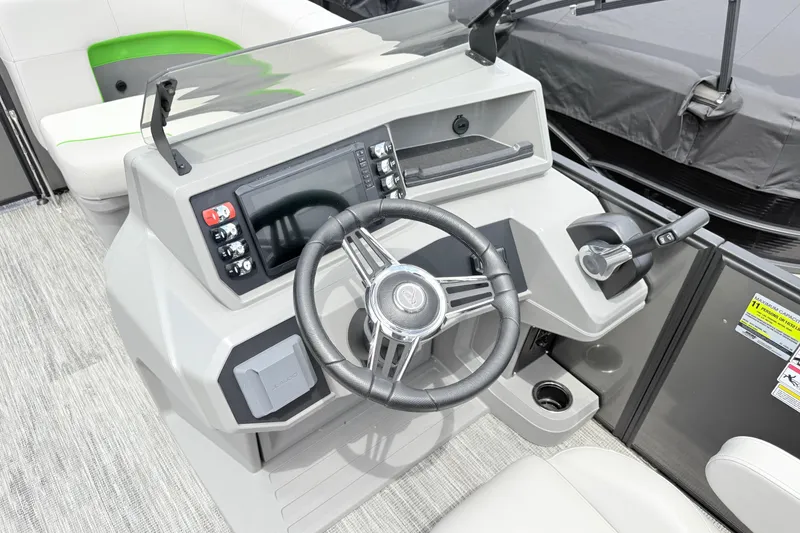 Slide: The Image of Steering console of 2026 Qwest E-Class RLS 18 pontoon boat with modern controls. - 17