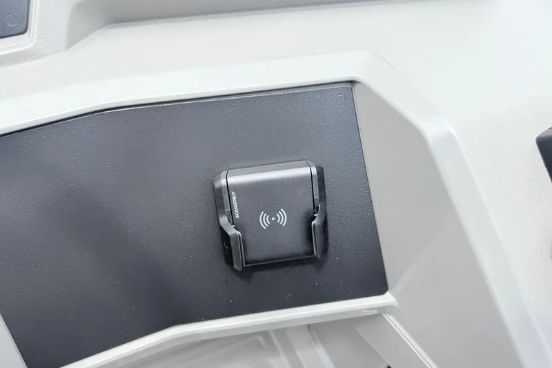 Slide: The Image of Wireless charging dock in 2026 Qwest E-Class RLS 18 vehicle interior. - 20