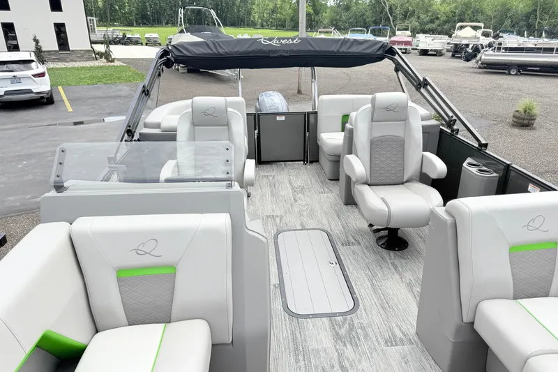 Slide: The Image of 2026 Qwest E-Class RLS 18 pontoon boat interior with modern seating and sleek design. - 5
