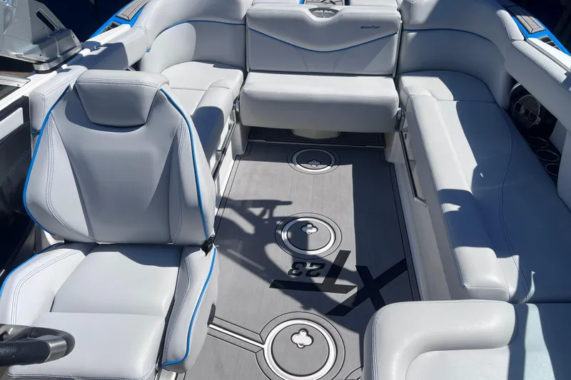 Slide: The Image of Luxurious interior of 2021 MasterCraft XT23 boat with sleek seating and modern design. - 13