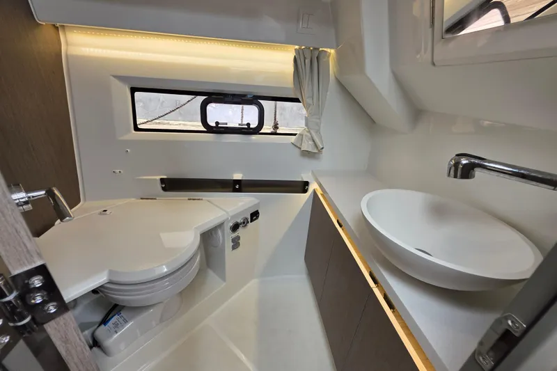 Slide: The Image of Modern bathroom interior of 2025 Jeanneau NC 895 Series 2 boat, featuring sleek design and fixtures. - 30