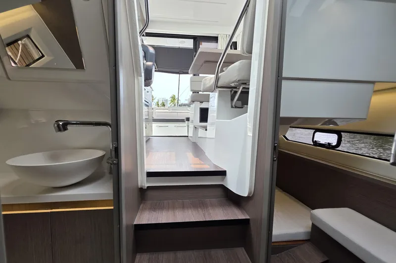 Slide: The Image of Interior view of 2025 Jeanneau NC 895 Series 2 boat, featuring modern design and amenities. - 34