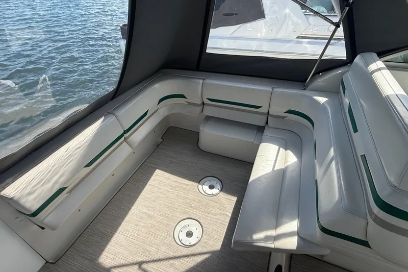 Slide: The Image of Interior seating of a 1999 Formula 34 Performance Cruiser with water view. - 14
