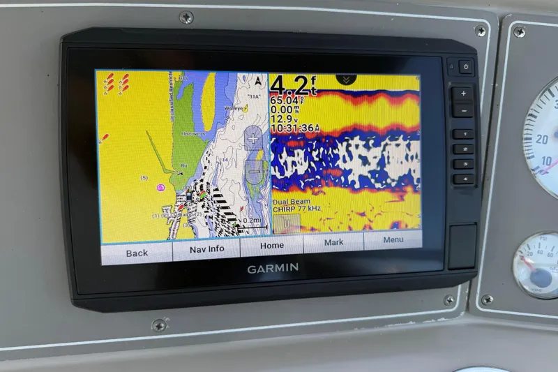 Slide: The Image of Garmin navigation display on 1999 Formula 34 Performance Cruiser showing depth and sonar data. - 21