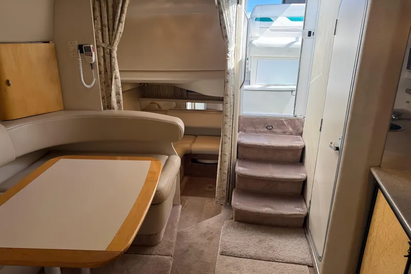 Slide: The Image of Interior of a 1999 Formula 34 Performance Cruiser with seating and stairs. - 30
