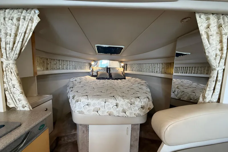 Slide: The Image of Interior of 1999 Formula 34 Performance Cruiser with cozy bed and elegant decor. - 32