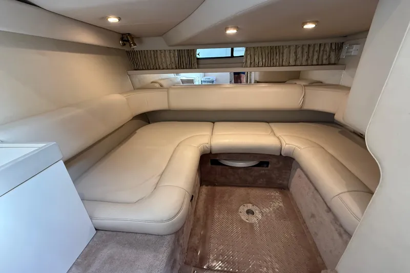 Slide: The Image of 1999 Formula 34 Performance Cruiser interior with beige seating and modern lighting. - 36
