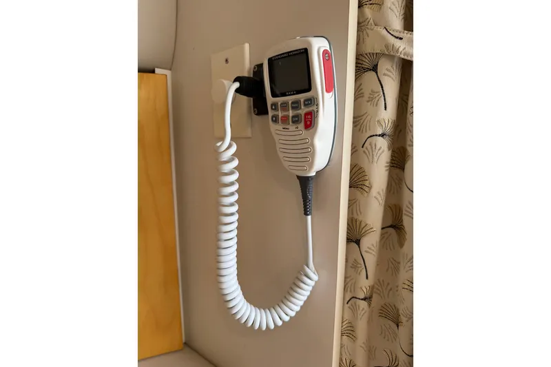 Slide: The Image of VHF marine radio mounted on a 1999 Formula 34 Performance Cruiser. - 40