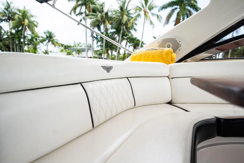 Slide: The Image of Luxurious interior of 2008 Regal Commodore 4460 yacht with white leather seating. - 92