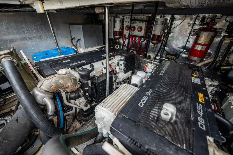 Slide: The Image of Engine room of a 2008 Regal Commodore 4460 yacht, featuring Volvo Penta engines. - 47