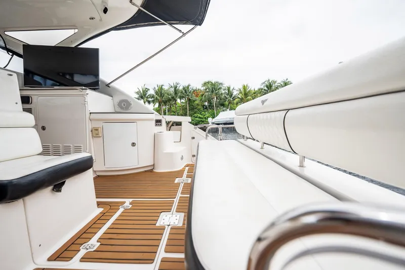 Slide: The Image of Luxurious 2008 Regal Commodore 4460 yacht interior with sleek seating and modern amenities. - 88