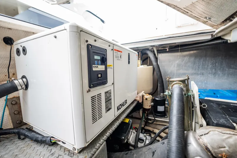 Slide: The Image of Engine room of 2008 Regal Commodore 4460 with Kohler generator. - 48
