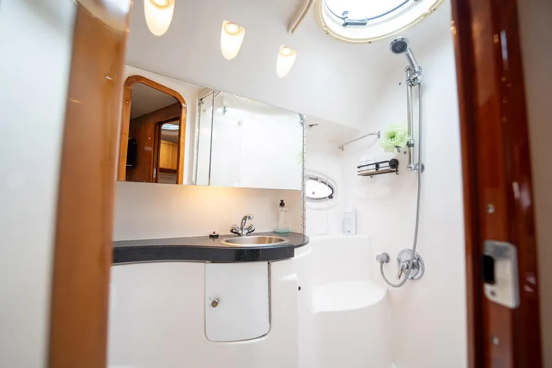 Slide: The Image of Luxurious bathroom interior of 2008 Regal Commodore 4460 yacht with modern fixtures. - 38