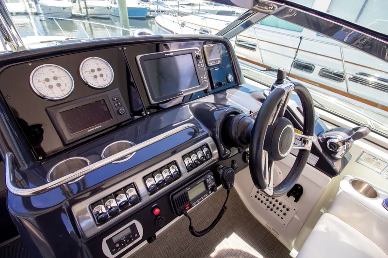 Slide: The Image of Cockpit of a 2016 Formula 40 Performance Cruiser with modern controls. - 13
