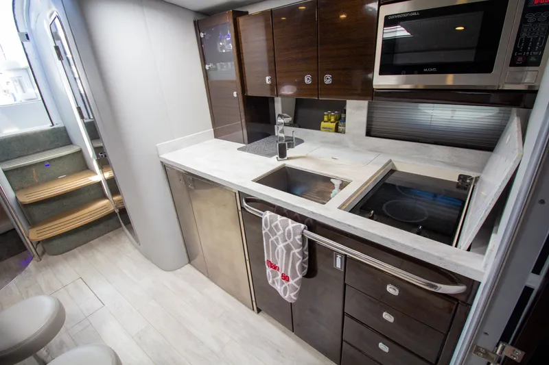 Slide: The Image of Modern kitchen in a 2016 Formula 40 Performance Cruiser yacht. - 19