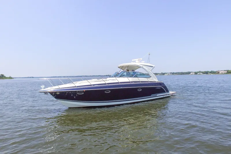 Slide: The Image of 2016 Formula 40 Performance Cruiser on calm waters under clear sky. - 11