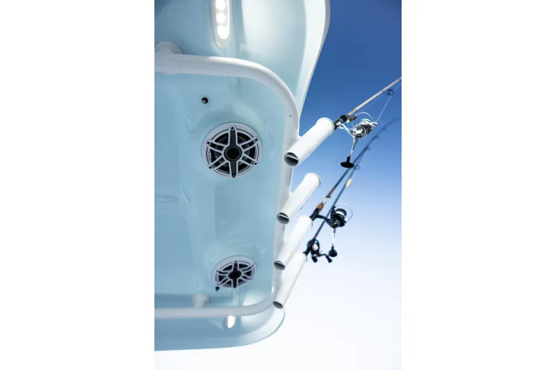 Slide: The Image of 2027 Sea Hunt Ultra 275 SE boat with fishing rods and speakers against blue sky. - 3