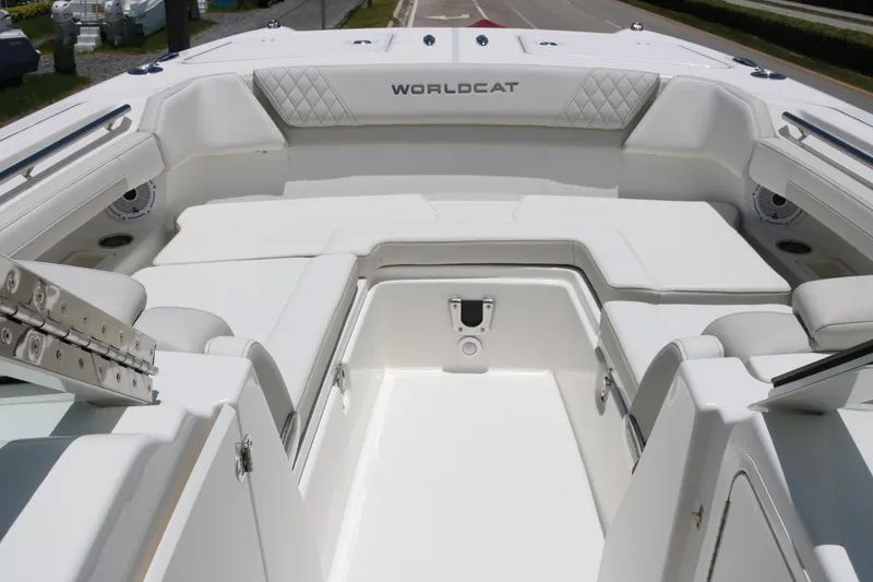 Slide: The Image of 2026 World Cat 280 DC-X boat interior with white seating and modern design. - 6
