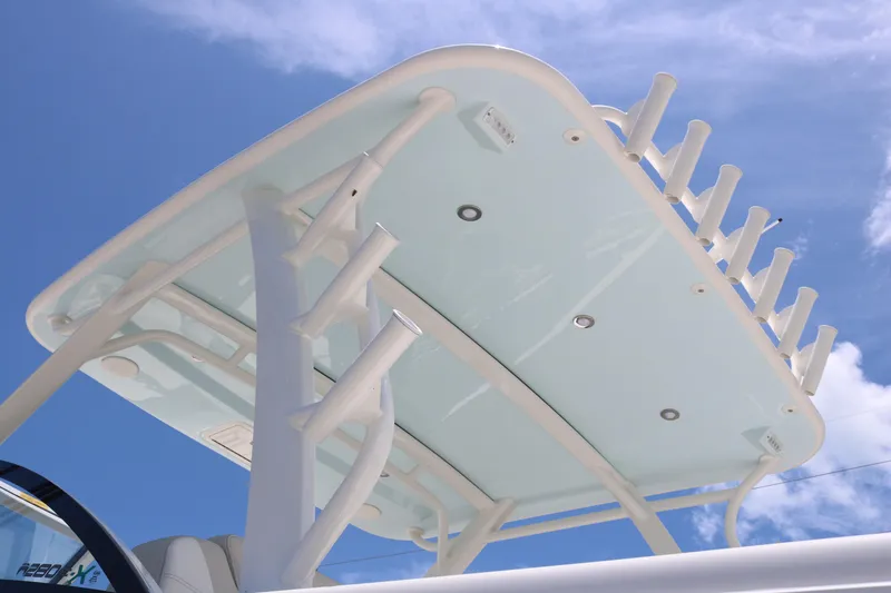Slide: The Image of 2026 World Cat 280 DC-X boat canopy against a clear blue sky. - 5