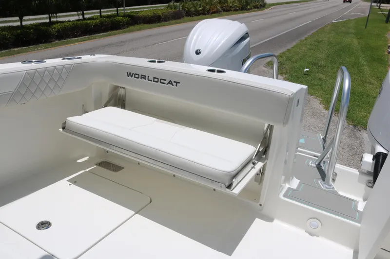Slide: The Image of 2026 World Cat 280 DC-X boat interior with foldable seating and sleek design. - 14