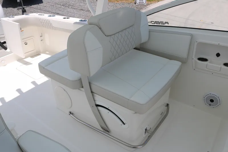 Slide: The Image of Luxury seating on 2026 World Cat 280 DC-X boat, featuring elegant white upholstery. - 11