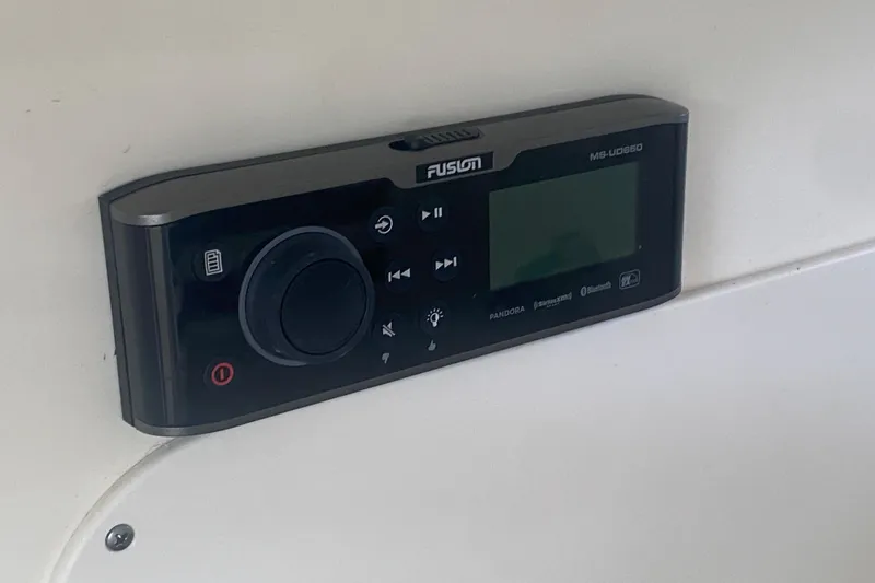 Slide: The Image of Fusion MS-UD650 marine stereo on 2016 Boston Whaler 330 Outrage boat dashboard. - 36