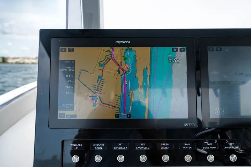 Slide: The Image of Navigation system on a 2021 Custom 368 Center Console boat. - 20