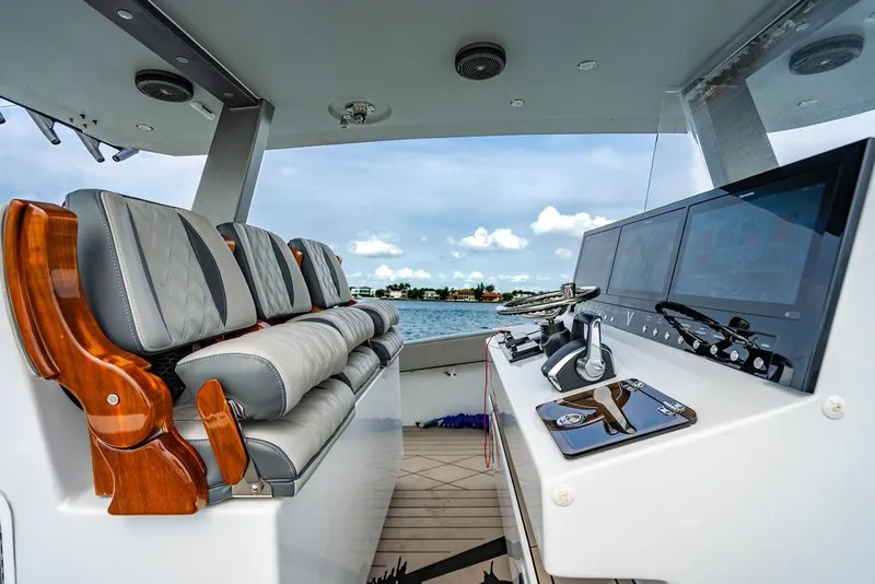Slide: The Image of Interior view of a modern boat with sleek seating and a state-of-the-art helm. - 28